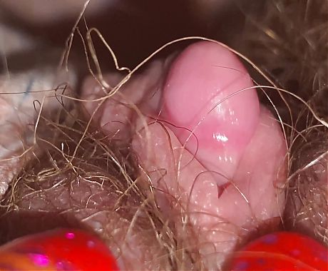 Extreme Close up huge clit head and hairy pussy